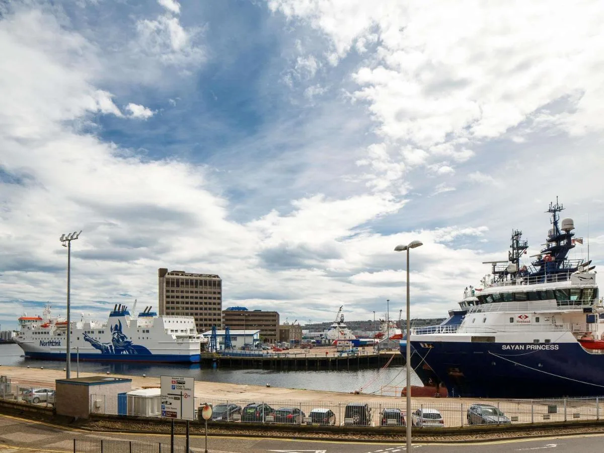 two large ships are docked in a harbor at ibis Aberdeen Centre – Quayside in Aberdeen